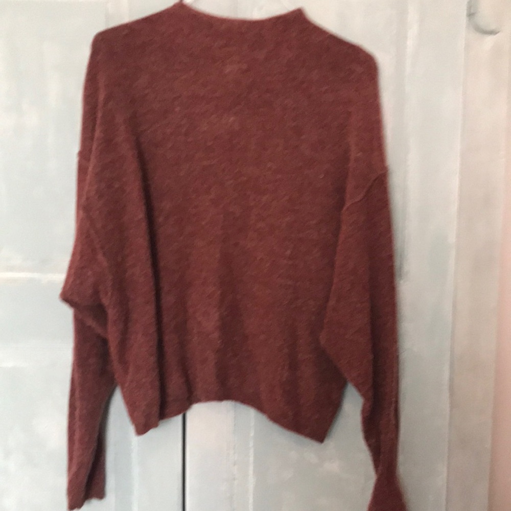 Free People Sweater in Size Large Colour is: burgundy . It has dropped sleeves